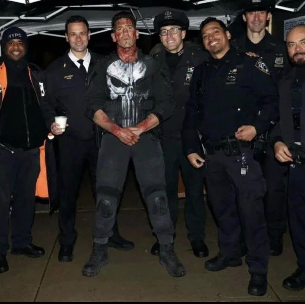 Frank (Jon Bernthal) posing with some police officers. Photo taken from behind the scenes of Daredevil: Born Again. 